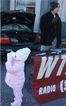 Georgia Anne enjoys hot apple cider at the 2006 Christmas Parade